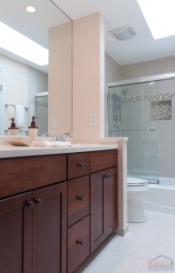 Vanity cabinets in bathroom remodel by Hammer Contractors