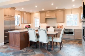 At this kitchen in Potomac, MD 20854, the designers turned this island into a two level piece.